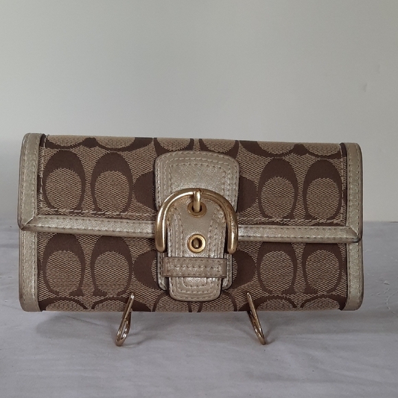 Coach Tan and Cream Clutch with Gold Buckle - Picture 1 of 14
